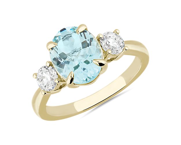 Oval Aquamarine and Diamond Sidestone Ring in 14k Yellow Gold