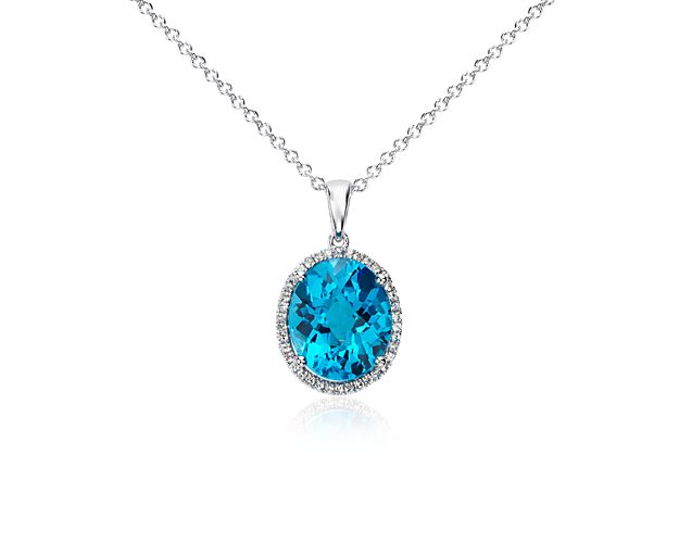 Swiss Blue Topaz and White Sapphire Halo Oval Pendant in Sterling Silver (12x10mm)