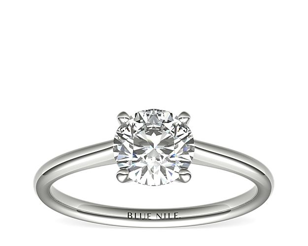 Petite Solitaire Engagement Ring in Platinum